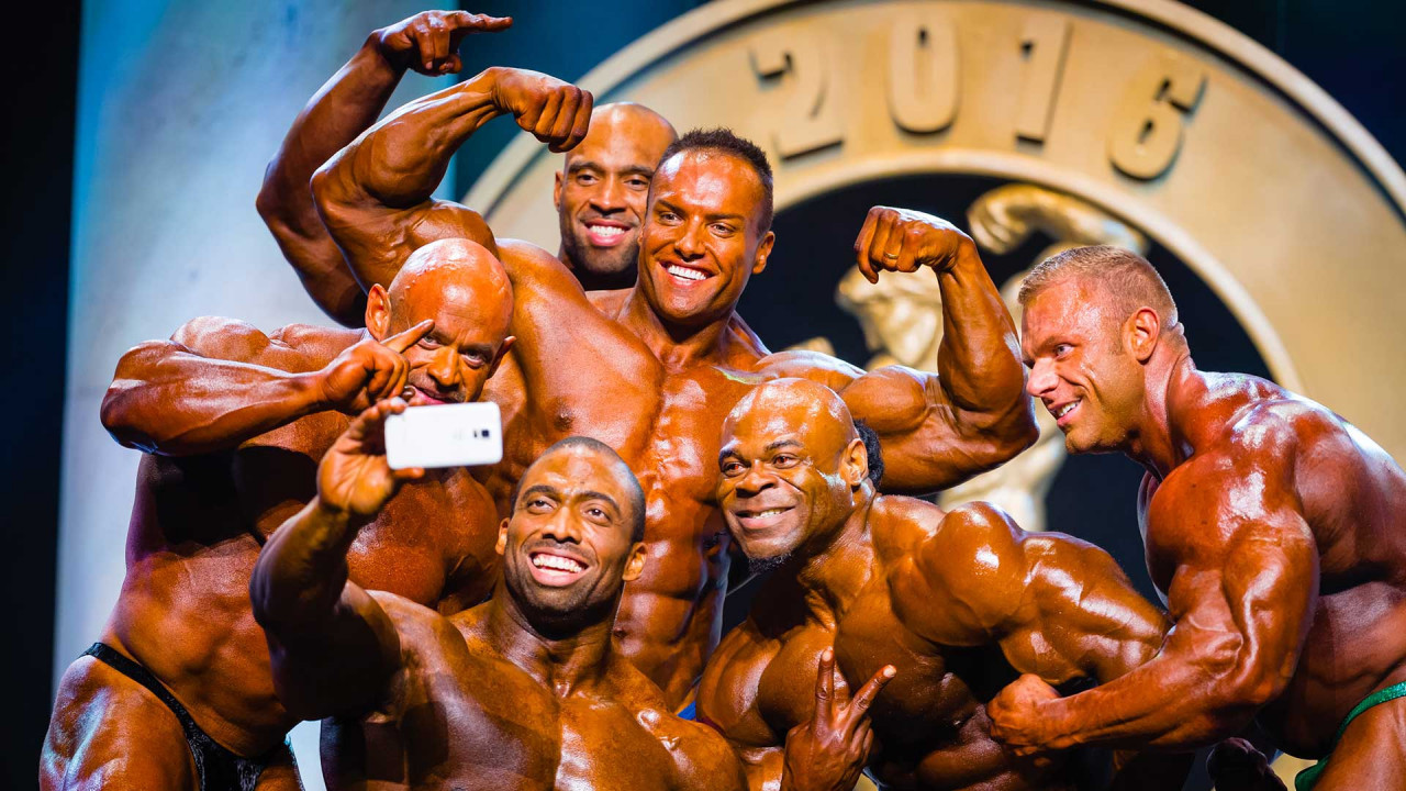 Group of competitors posing for a selfie.